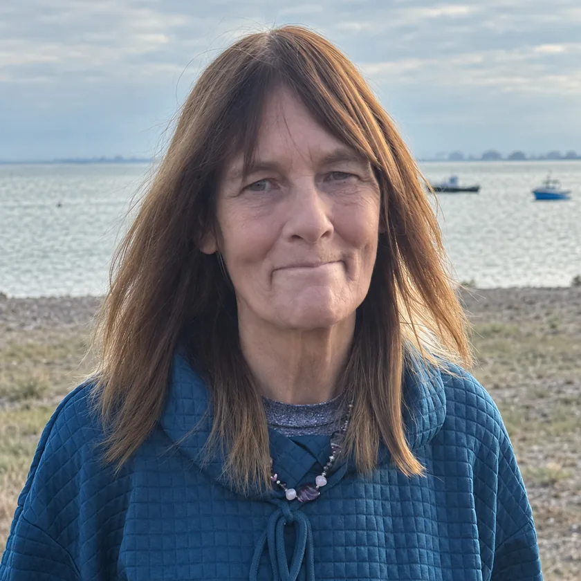 Portrait of the recovery coach behind Recovery For You Coaching, standing by the sea